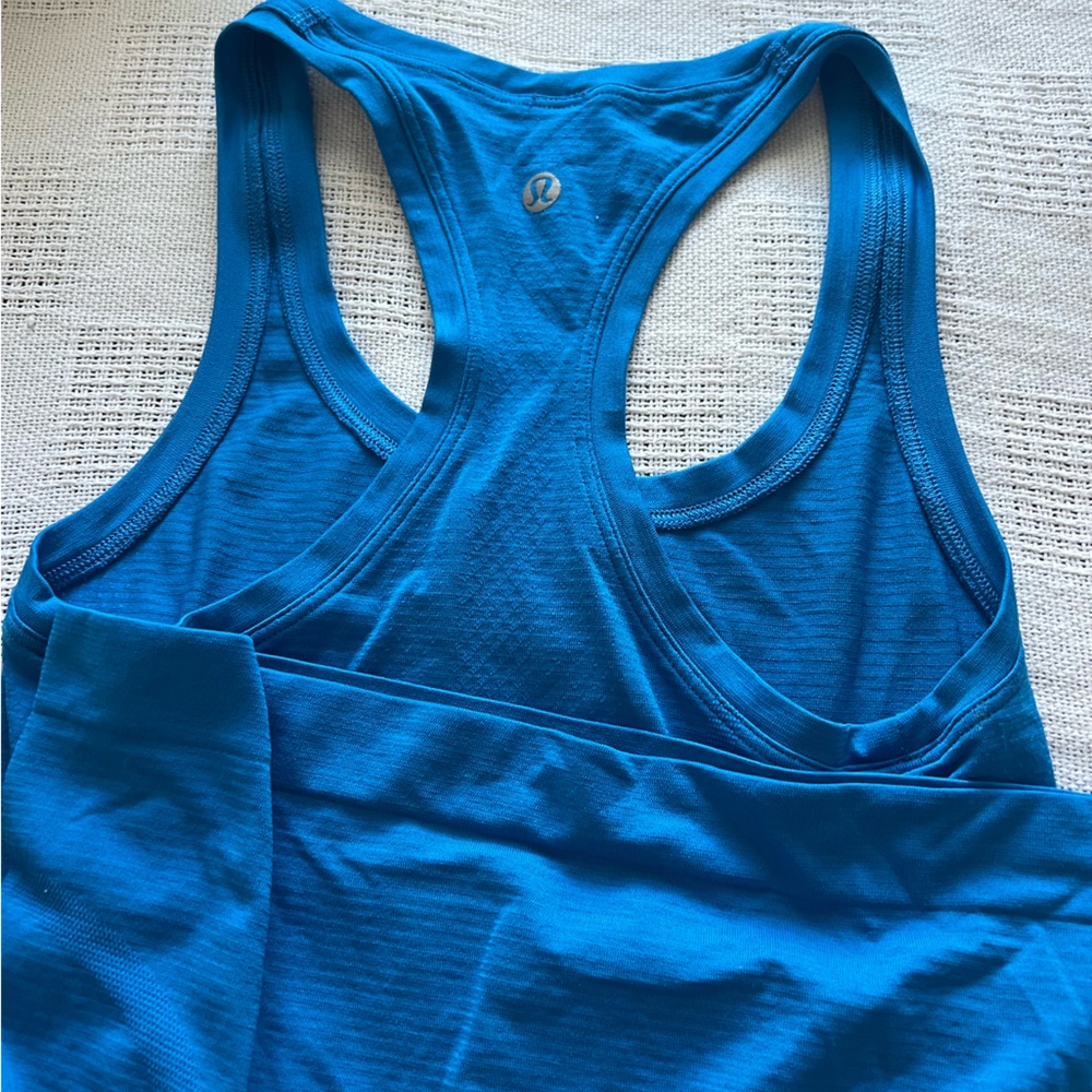 NEVER WORN, lululemon Swiftly Tech Racerback Tank Top 2.0
Hip Length